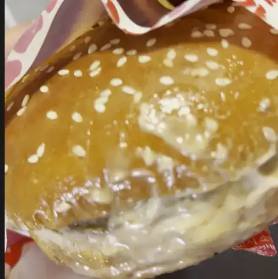 Unwrapped GS25 Bulgogi Burger on a plate