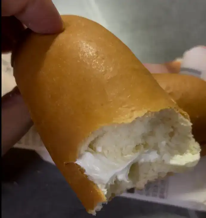 Inside filling of the GS25 Hyeja-roun Cream Stick Bread showing rich cream