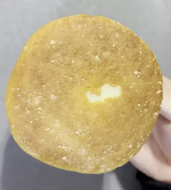 The unwrapped strawberry castella showing its fluffy texture
