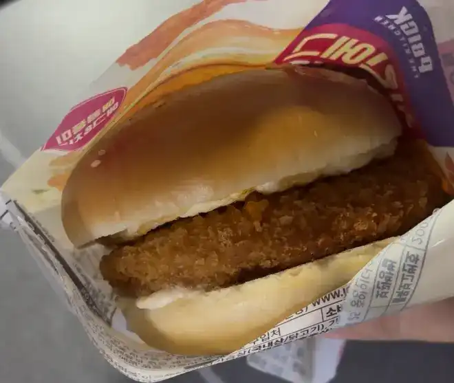 Unwrapped CU Chicken Egg Spicy Burger ready to eat