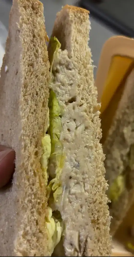 Close-up of the soft chicken and soy garlic sauce filling