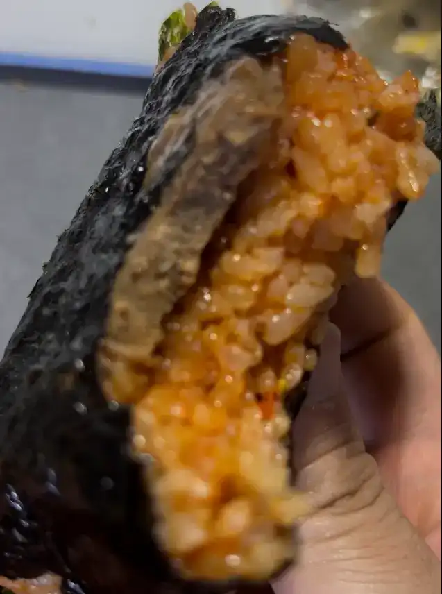 Inside view showing the Tteokgalbi patty inside the spicy Jeonju Bibim rice