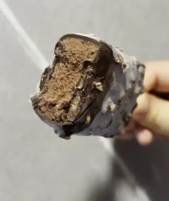 Inside look at the filling of the Netflix Low Sugar Almond Chocolate Bar