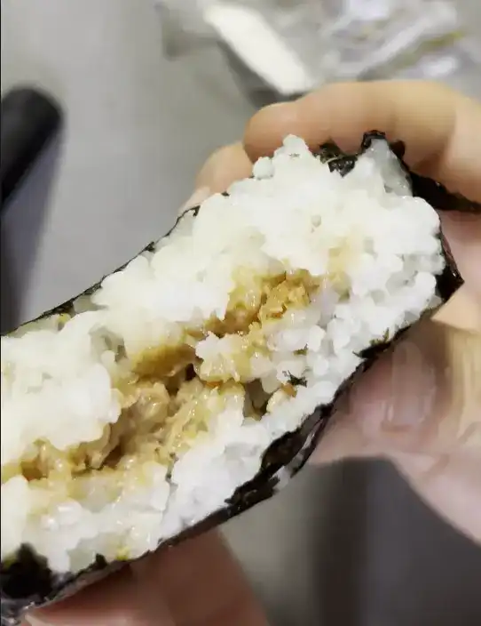A close-up of the disappointing filling inside the gimbap