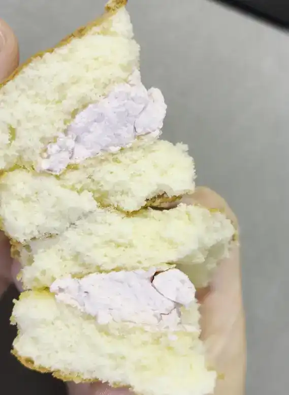 A bite-taken view of the strawberry castella cake
