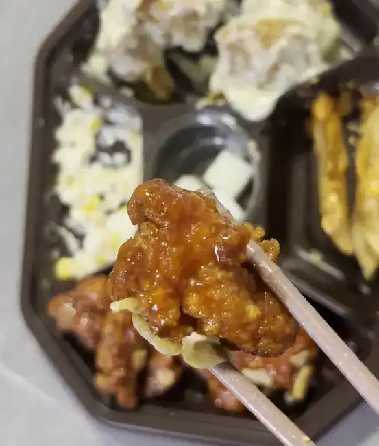 Close-up of the spicy Dakgangjeong chicken piece