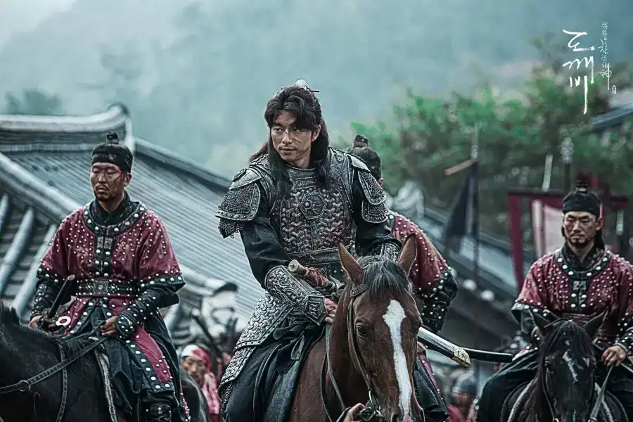 A cinematic scene from Guardian: The Lonely and Great God showing the deep fated connection and reincarnation between past and present lives