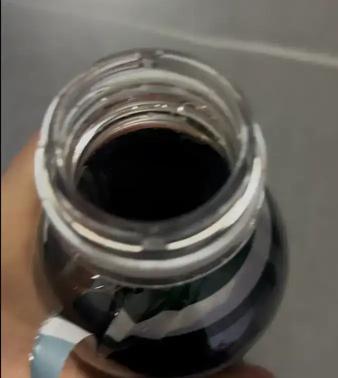 The opened bottle of the GS25 Coffee Bean Decaf Americano