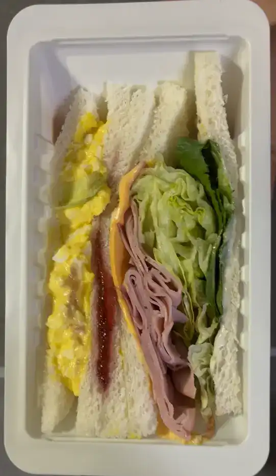 Unwrapped CU Half & Half Sandwich showing both pieces